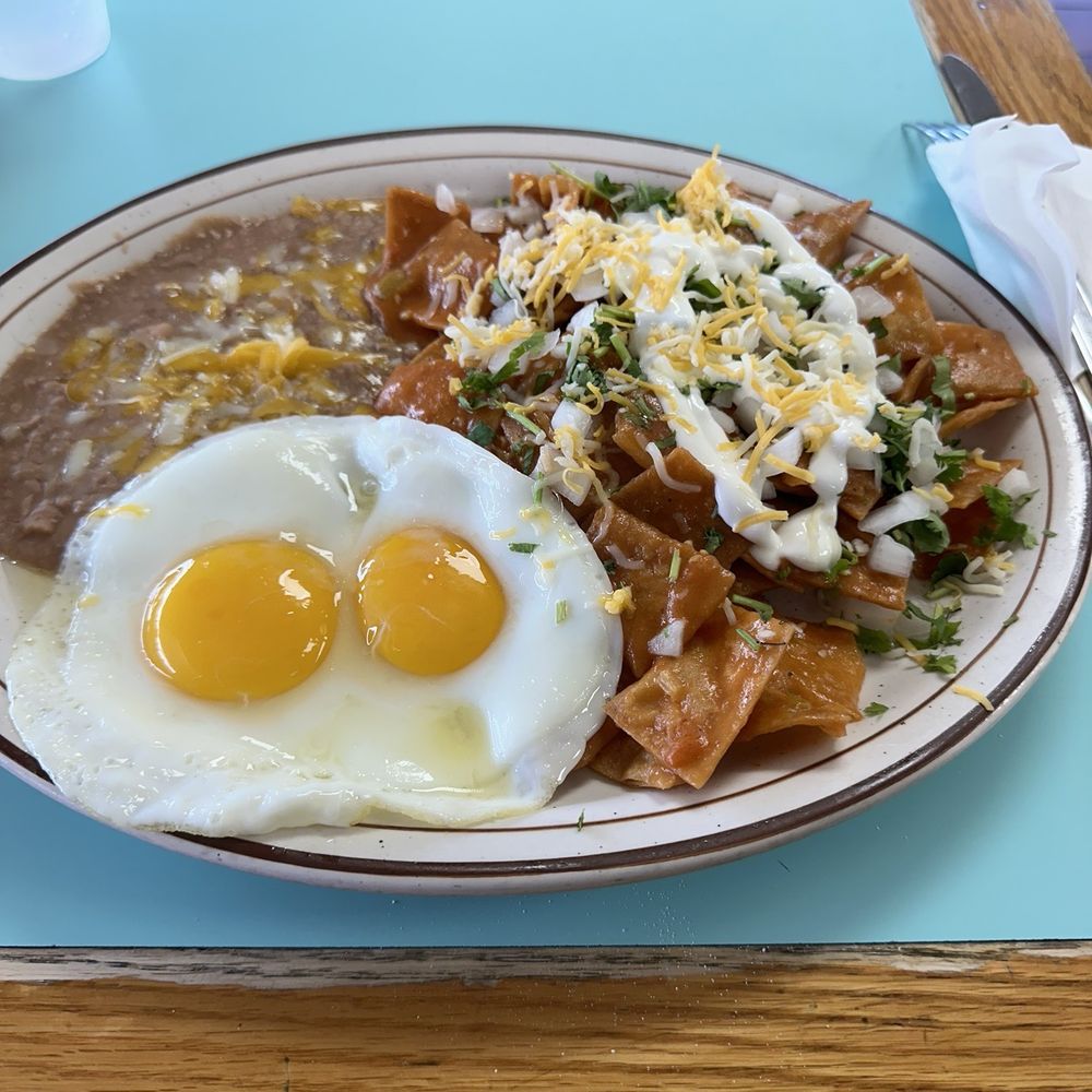 Chilaquiles with mild red sauce. Not on the menu but you can order it with either red or green sauce. Chilaquiles with mild red sauce. Not on the menu but you can order it with either red or green sauce.