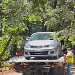 Car Loaded on Towtruck Car Loaded on Towtruck