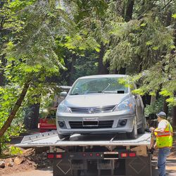 Blue Streak Towing - Car Loaded on Towtruck