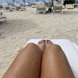 Ship Shape Tan & Spa - Beach in Aruba -- showing Legs after Ellen's custom tan. Woot!