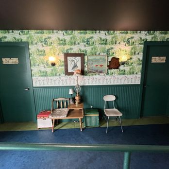 Camp Trippalindee - a room with a table and two chairs - Bars Near Me - Madison, Wisconsin Camp Trippalindee - a room with a table and two chairs - Bars Near Me - Madison, Wisconsin