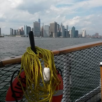 Manhattan by Sail - View of Manhattan from the stern of the boat - Boat Charters Near Me