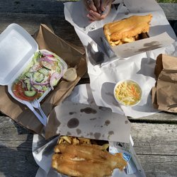Halibut House Fish and Chips - Two Monday specials (which we couldn't finish), a Greek salad, and sauerkraut :) Very delicious!