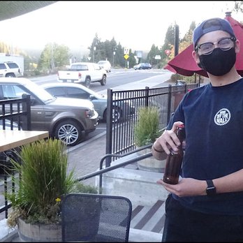 Burger Me - Meet Bryce, my friendly host, who brought out my beer to me to enjoy before my hamburger and fries arrived. - Burgers Near Me - Truckee, California