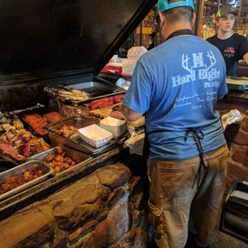Hard Eight BBQ - Close up of them cutting fat off brisket - Barbeque Near Me - Coppell, Texas