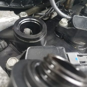Valvoline Instant Oil Change - Picture of hole in valve cover caused by attendant filling with oil during oil change. - Oil Change Stations Near Me - Bridgeport, Connecticut Valvoline Instant Oil Change - Picture of hole in valve cover caused by attendant filling with oil during oil change. - Oil Change Stations Near Me - Bridgeport, Connecticut