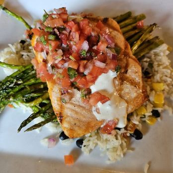 Fire By The Monon - Southwest grilled salmon with pico de Gallo, asparagus, and rice with beans - American Near Me - Indianapolis, Indiana Fire By The Monon - Southwest grilled salmon with pico de Gallo, asparagus, and rice with beans - American Near Me - Indianapolis, Indiana