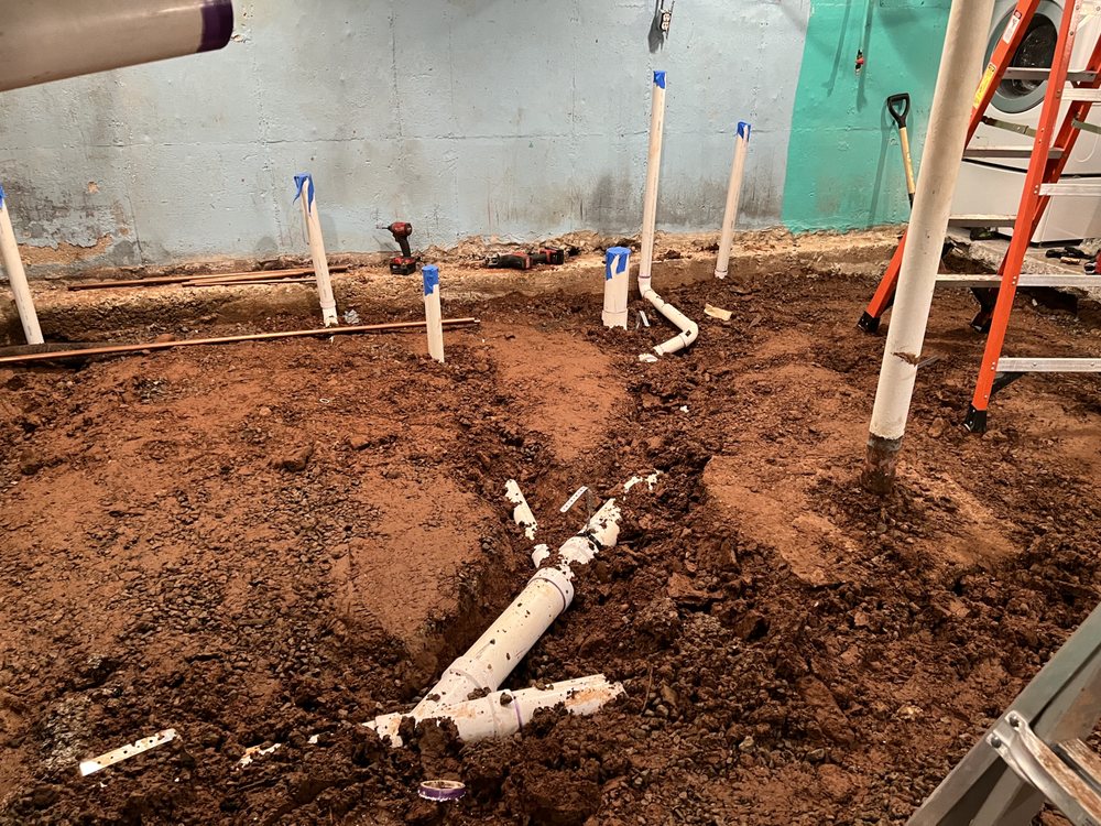 Slide of Family Drain Cleaning