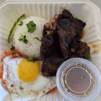 Xin Chào - Pork chop entree,  come with egg, sauce,  and veggies. - Vietnamese Near Me - Maple Grove, Minnesota
