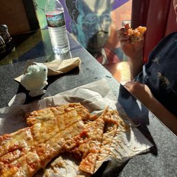 Cheese pizza cut into squares for my son Cheese pizza cut into squares for my son