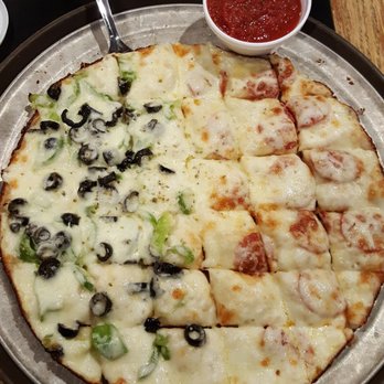 Pizza Pro's - Baked cheese nuggets. Half green peppers & black olives and half pepperoni. - Pizza Near Me - DeKalb, Illinois Pizza Pro's - Baked cheese nuggets. Half green peppers & black olives and half pepperoni. - Pizza Near Me - DeKalb, Illinois