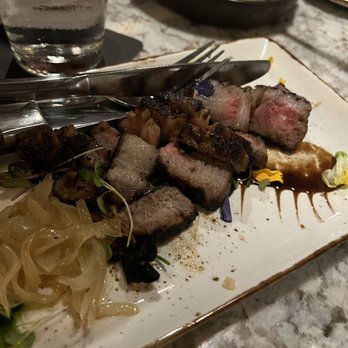 Jimmy P's Charred - Japanese A5 New York Strip chopped like dog meat not sliced. Med well, not medium rare. - Steakhouses Near Me - Naples, Florida Jimmy P's Charred - Japanese A5 New York Strip chopped like dog meat not sliced. Med well, not medium rare. - Steakhouses Near Me - Naples, Florida