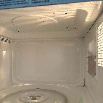 Simply Wise Cleaning - Food stains in the microwave from previous guest - Home Cleaning Near Me - Madison, Alabama