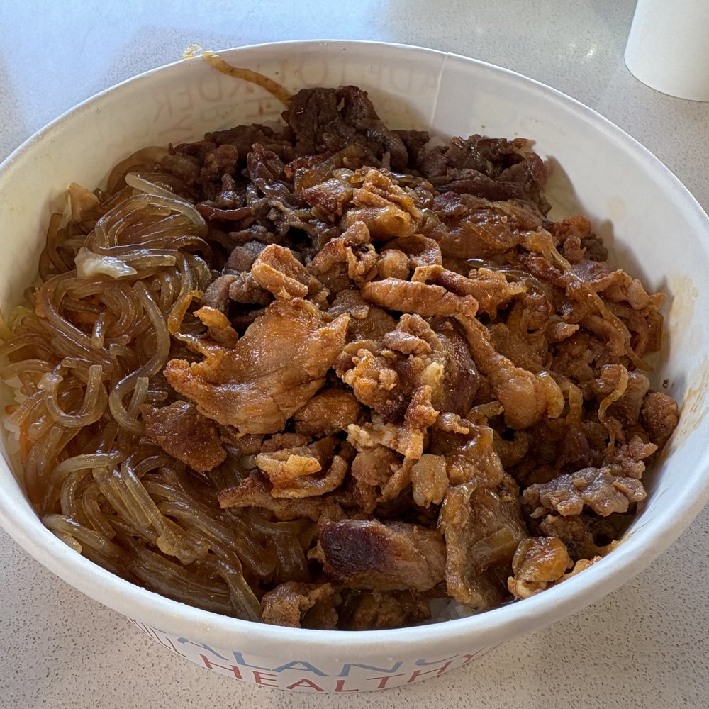 California Gogi Grill - Stacked Bowl - Bulgogi and Spicy Pork over Japchae and Rice - Korean Near Me - Irvine, California California Gogi Grill - Stacked Bowl - Bulgogi and Spicy Pork over Japchae and Rice - Korean Near Me - Irvine, California
