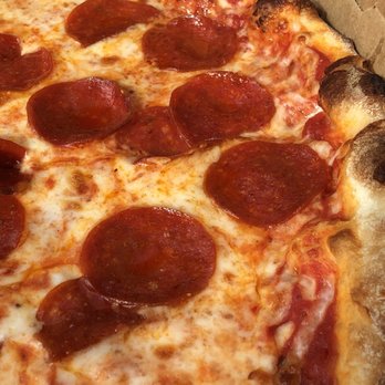 Pizza Mania - Closeup pepperoni - Pizza Near Me - Wesley Chapel, Florida Pizza Mania - Closeup pepperoni - Pizza Near Me - Wesley Chapel, Florida