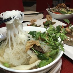 Au Lac - Our Hu Tieu has chrysanthemum leaves, mushrooms, yuba and rice noodles in a fragrant garlic broth.