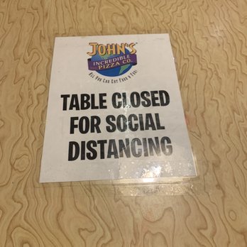John's Incredible Pizza - Riverside - Tables and booths are spaced out/closed for social distancing. - Arcades Near Me - Riverside, California