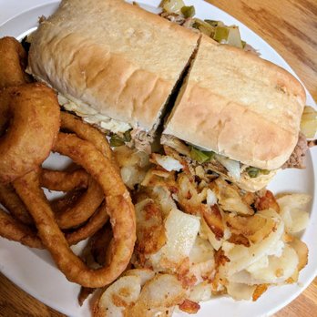 Back Porch Smokehouse - Smokehouse special. (This is a Philly Cheese steak with pulled pork or chicken). Onion rings and fried potatoes aka taters. - Barbeque Near Me - Mount Vernon, Kentucky