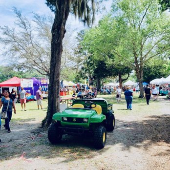 Orange Park - a green jeep parked under a tree - Farmers Market Near Me - Orange Park, Florida