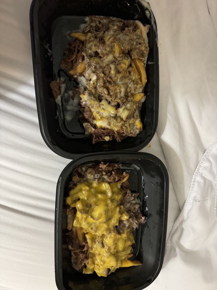 Pardon My Cheesesteak Logo