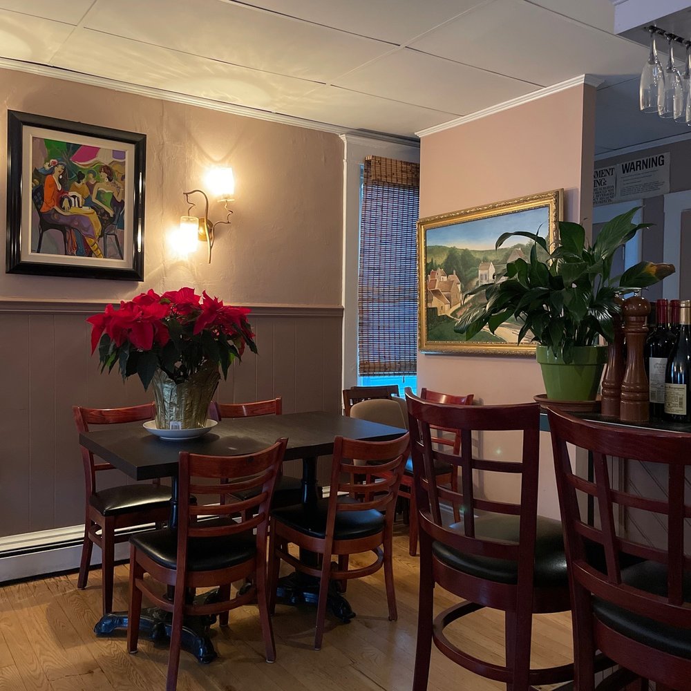 a table and chairs in a restaurant