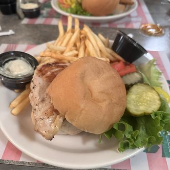 Dontino's Italian Restaurant - Grilled Chicken Sandwich with French Fries - Italian Near Me - Akron, Ohio Dontino's Italian Restaurant - Grilled Chicken Sandwich with French Fries - Italian Near Me - Akron, Ohio