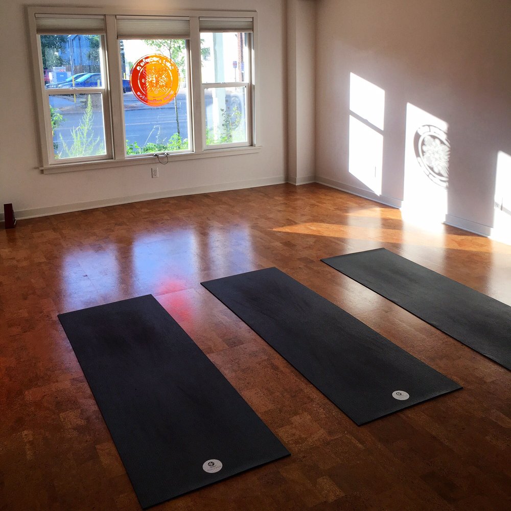 The People’s Yoga Collective Logo