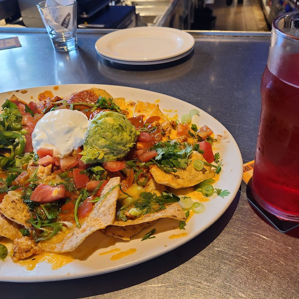 Yard House - No longer the same chicken nachos pre-covid era - New American Near Me - Carlsbad, California