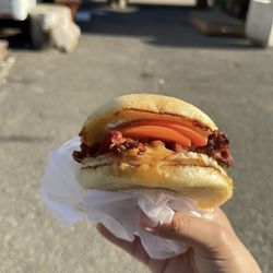 Two of Us - Bacon, Egg, and Cheese sandwich with tomatoes