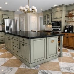 Elizabeth Hall Designs - Gulfport, MS Kitchen Renovation Design including removing a peninsula and creating a large kitchen island with sage green cabinetry.