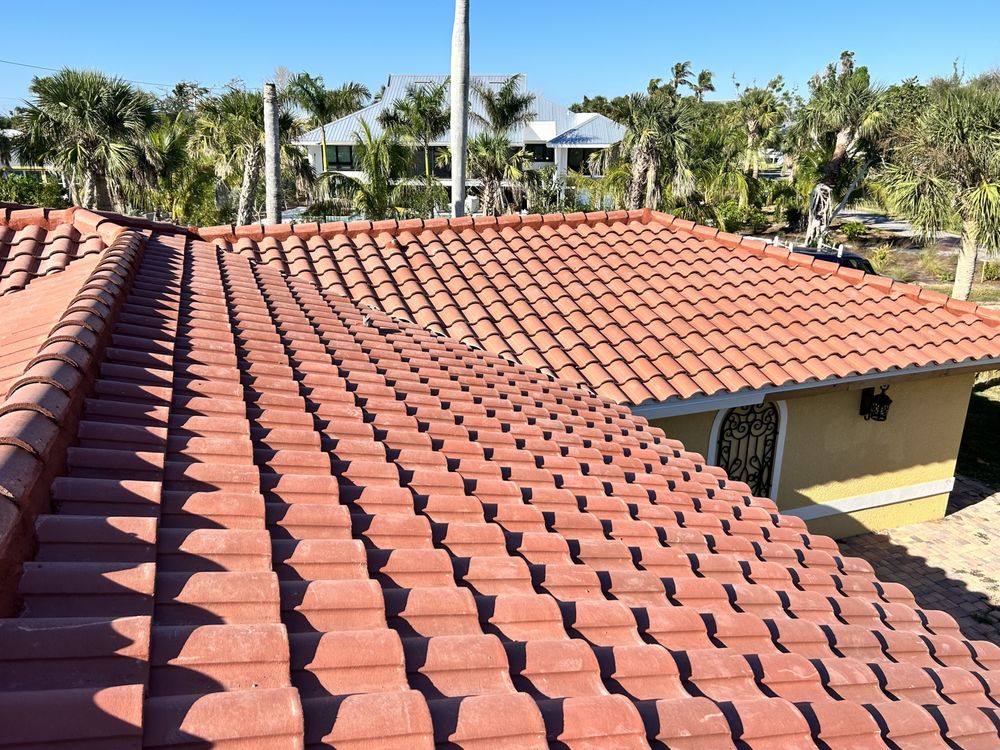 Slide of Coastal Elite Roofing Solutions