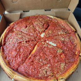 Medium deep dish sausage and spinach pizza Medium deep dish sausage and spinach pizza