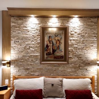 Schneider Design & Construction - a bed in a bedroom - Handyman Near Me - Greenwood, Indiana Schneider Design & Construction - a bed in a bedroom - Handyman Near Me - Greenwood, Indiana