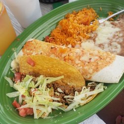 Blue Iguana Tequila Bar - Beef taco and shredded chicken burrito with rice and beans.