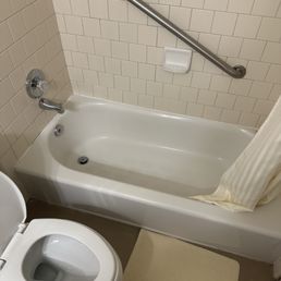 Very small bathtubs and toilet. Very small bathtubs and toilet.