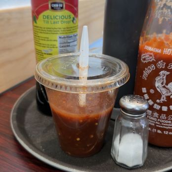 Pho My Chau 2 - Chili sauce in a plastic cup - Vietnamese Near Me - Federal Way, Washington Pho My Chau 2 - Chili sauce in a plastic cup - Vietnamese Near Me - Federal Way, Washington
