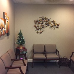 Smithtown Family Dentistry - Nice clean waiting room, decorated for the holidays.
