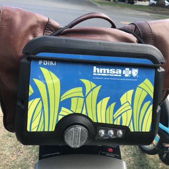 Biki - Front plate with "luggage" space bungee cord stretched into a triangle, minimizing capacity. - Community Service/Non-Profit Near Me - Honolulu, Hawaii Biki - Front plate with "luggage" space bungee cord stretched into a triangle, minimizing capacity. - Community Service/Non-Profit Near Me - Honolulu, Hawaii