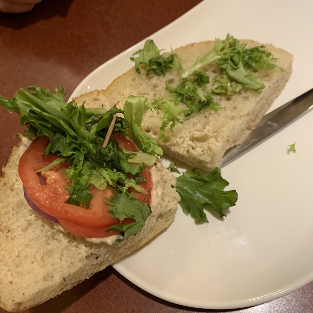 The reall Panera Tuna sandwich. Tuna under tomato.. Compare to  stock photos from Panera