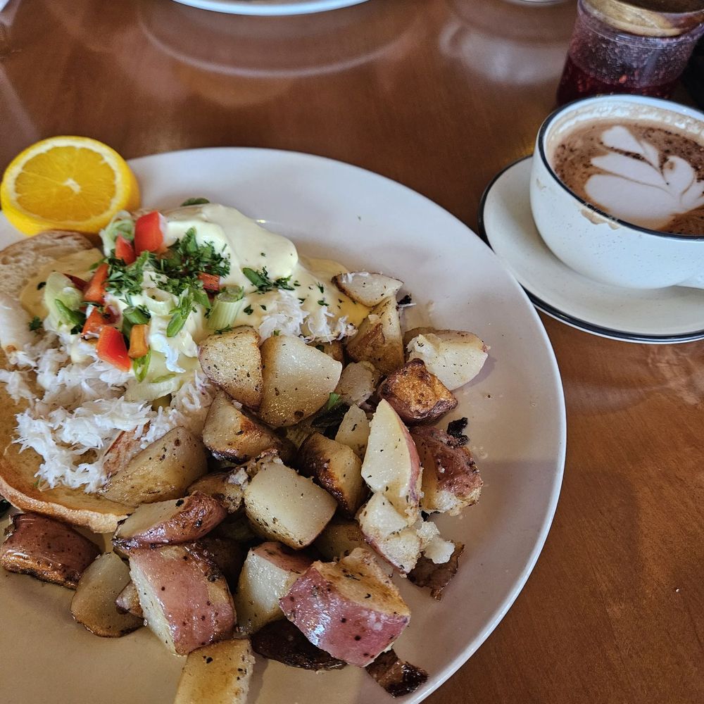 Crab Benedict (front), bagel in back Crab Benedict (front), bagel in back