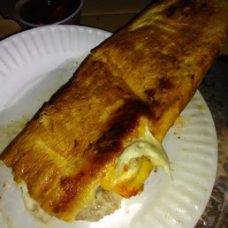 Soggy Stromboli delivered busted open and burnt!