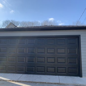 Neet Construction - I love the color scheme.  They sloped the entry to prevent water from coming in. - Garage Door Services Near Me