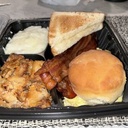 Uncle Honey's Home Style Desserts - Potato's bacon biscuit eggs bacon sausage link and grits
