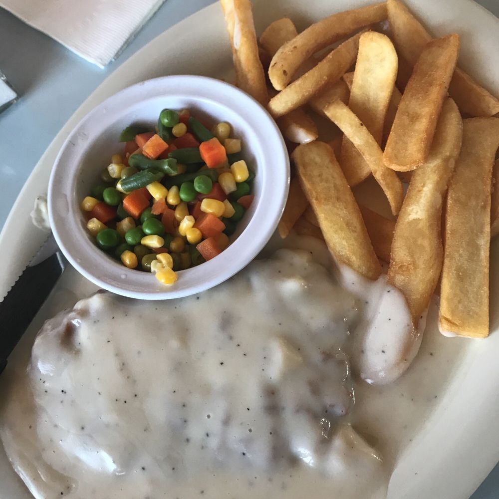 The Village Grille - Chicken fried steak with white gravy instead of the brown - American Near Me - Lancaster, California The Village Grille - Chicken fried steak with white gravy instead of the brown - American Near Me - Lancaster, California