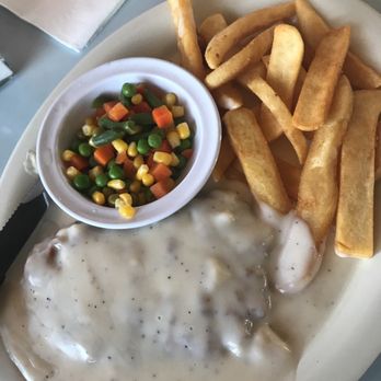 The Village Grille - Chicken fried steak with white gravy instead of the brown - American Near Me - Lancaster, California The Village Grille - Chicken fried steak with white gravy instead of the brown - American Near Me - Lancaster, California