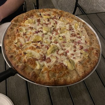 The Phoenix Pizza Co - White Sauce Pizza, grilled chicken and artichoke, with an Italian seasoning dusted on the crust - Pizza Near Me - Quincy, Washington The Phoenix Pizza Co - White Sauce Pizza, grilled chicken and artichoke, with an Italian seasoning dusted on the crust - Pizza Near Me - Quincy, Washington