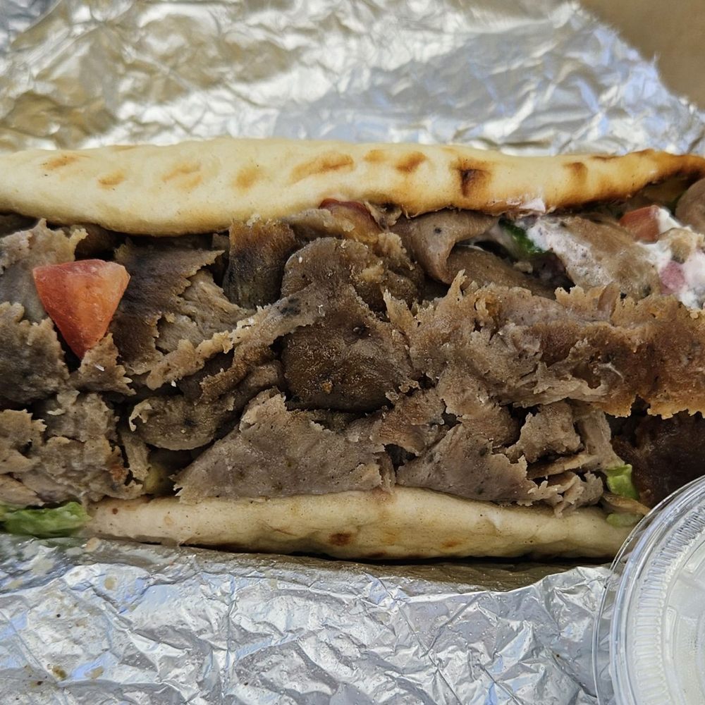 The Dizzy Pita - Beef/lamb gyro! Was huge, veggies were perfect & tzatziki sauce is very good! Yum! - Mediterranean Near Me - Kamuela, Hawaii The Dizzy Pita - Beef/lamb gyro! Was huge, veggies were perfect & tzatziki sauce is very good! Yum! - Mediterranean Near Me - Kamuela, Hawaii
