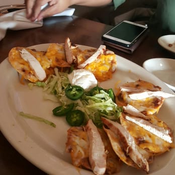 Uncle Julio's - $13.99 nachos missing 2 pieces - Mexican Near Me - Naperville, Illinois Uncle Julio's - $13.99 nachos missing 2 pieces - Mexican Near Me - Naperville, Illinois