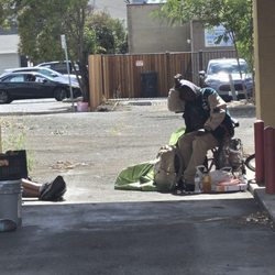 Simon C Chan, MD - Homeless camping on property next to legitimate downtown business offices and restaurants.