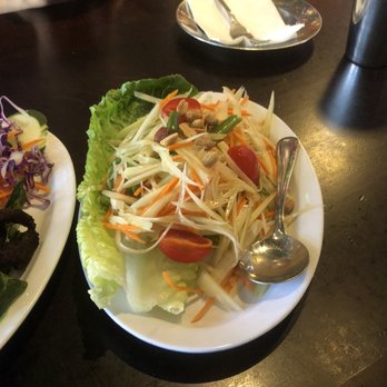 Pestle Rock - SOM TUM (Green papaya, carrot, garlic, cherry tomatos, green beans, and roasted peanuts in a palm sugar lime dressing) - Thai Near Me - Seattle, Washington